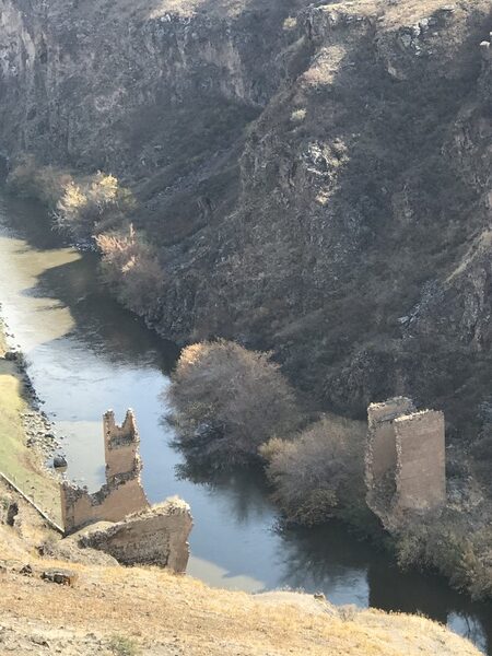 Ruins of a bridge over the river dividing modern day Turkiye and Armenia